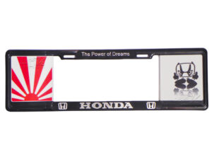 MARCO PORTAPLACA TIPO EUROPEO EDICION HONDA RUDE DEMON JAPAN RISING SUN HECHO DE PLASTICO ABS CON LETRAS EN RELIEVE, CALCOMANIAS EN VINIL AUTOADHERIBLE IMPRESO CON REFLEJANTE, COMPATIBLE CON TODAS LAS PLACAS MEXICANAS.