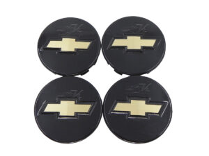 SET CON 4 CENTROS DE RIN CON DIAMETRO DE 52 MM COMPATIBLE CON VEHICULOS CHEVROLET, HECHO DE PLASTICO ABS CON PARTE DELANTERA NEGRO BRILLANTE.